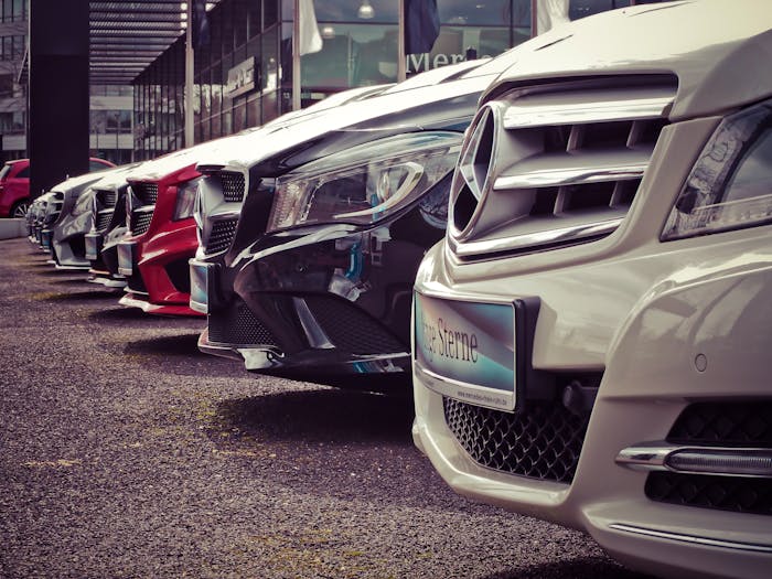 Row of cars at a dealership lot